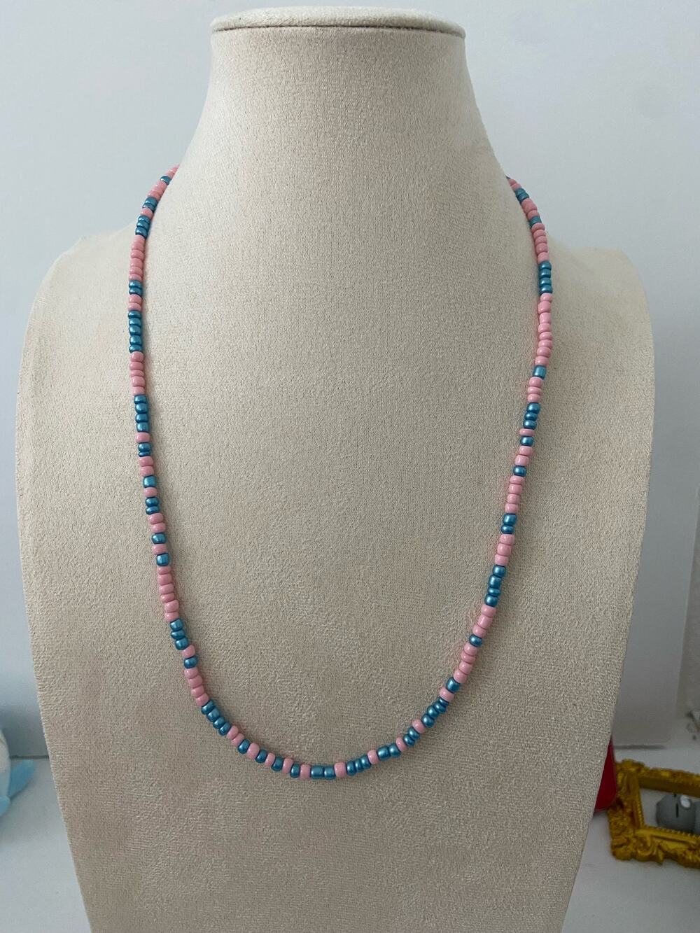 blue and pink beaded necklace